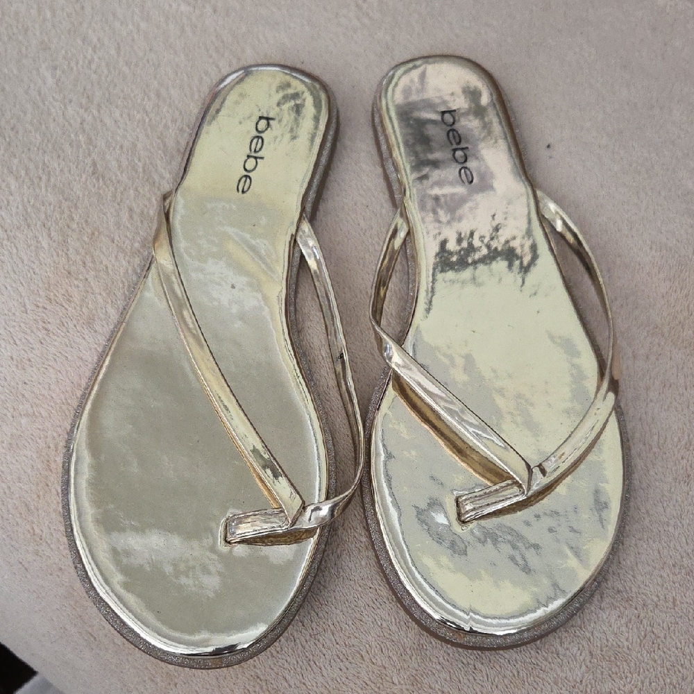 Bebe Gold Shiny Flip Flops